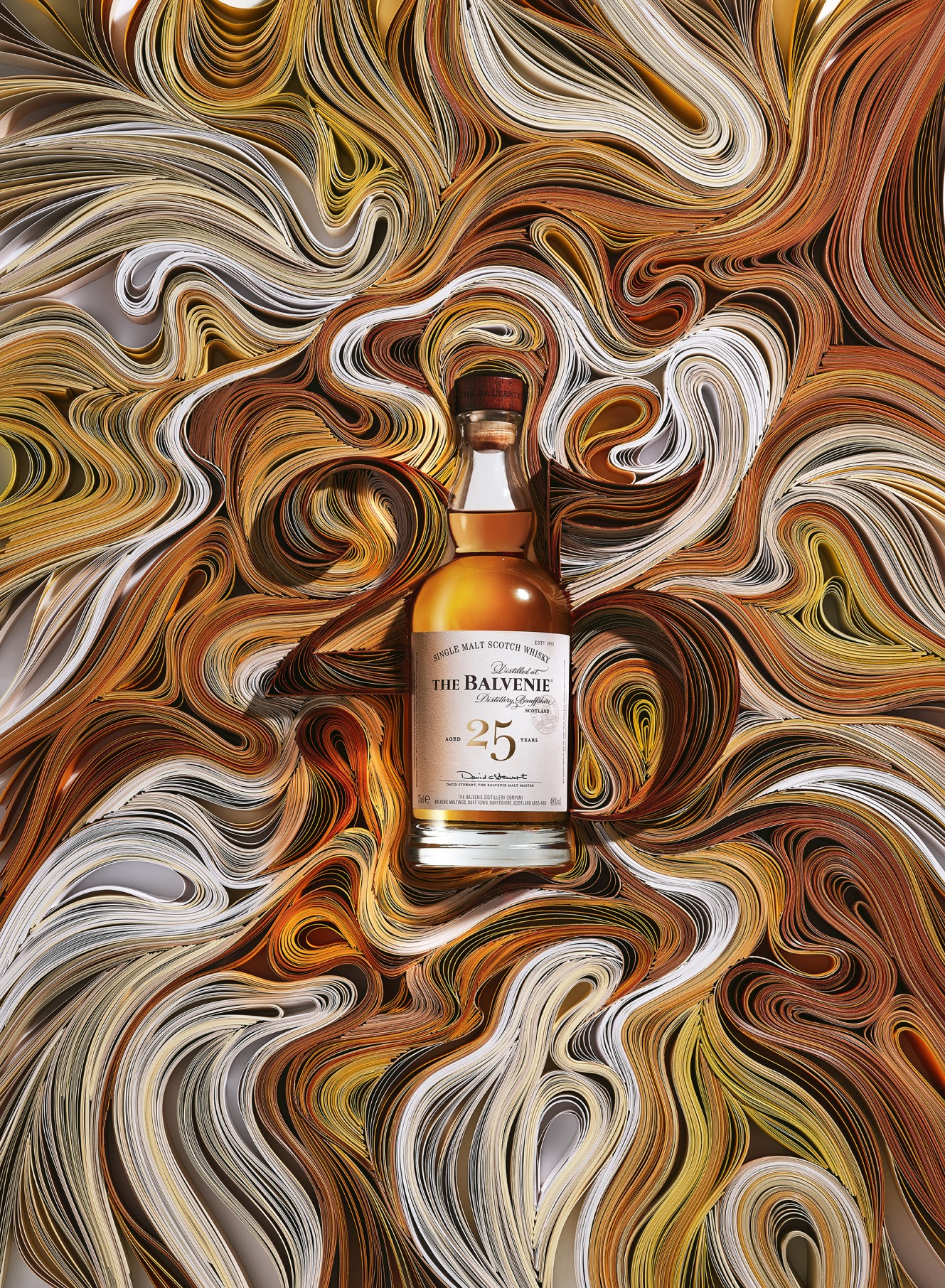 Balvenie 25 set against commemorative artwork by Yulia Broadskaya