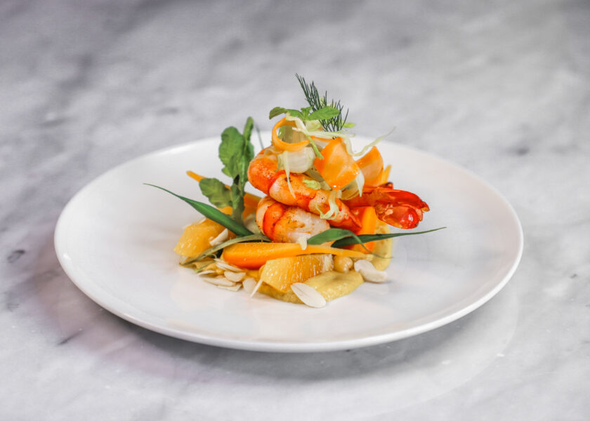 Seared prawns, baby carrot, shaved fennel and orange salad, almonds and orange blossom dressing
