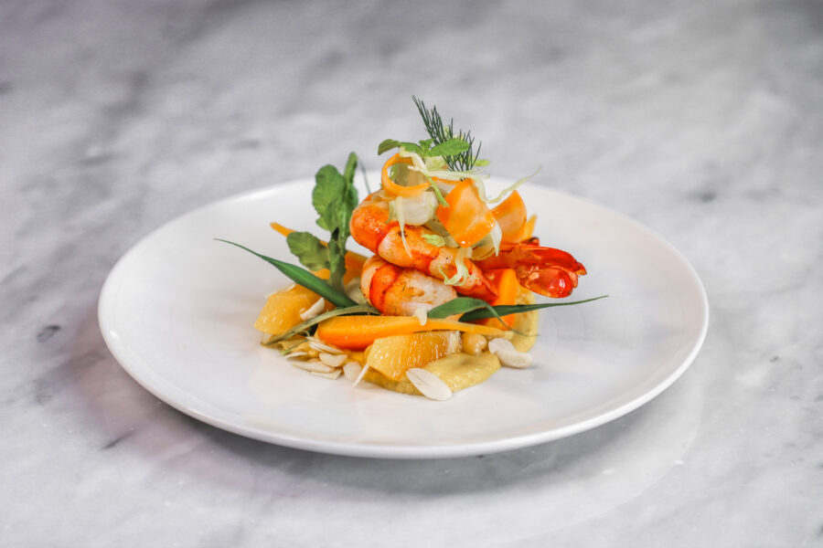 Seared prawns, baby carrot, shaved fennel and orange salad, almonds and orange blossom dressing