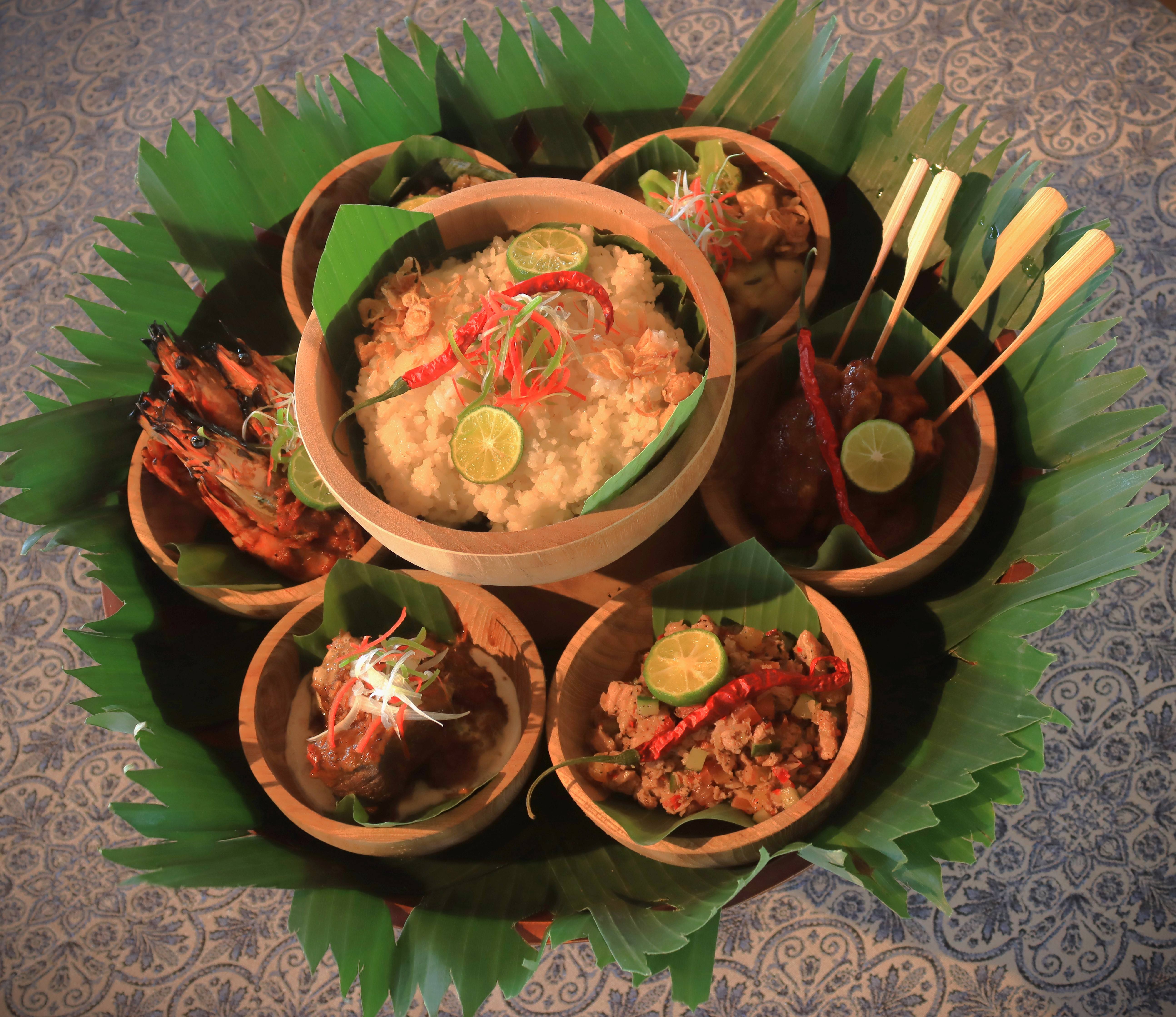 The Megibung Balinese feast presented by the Jimbaran Puri, a Belmond Hotel, Bali