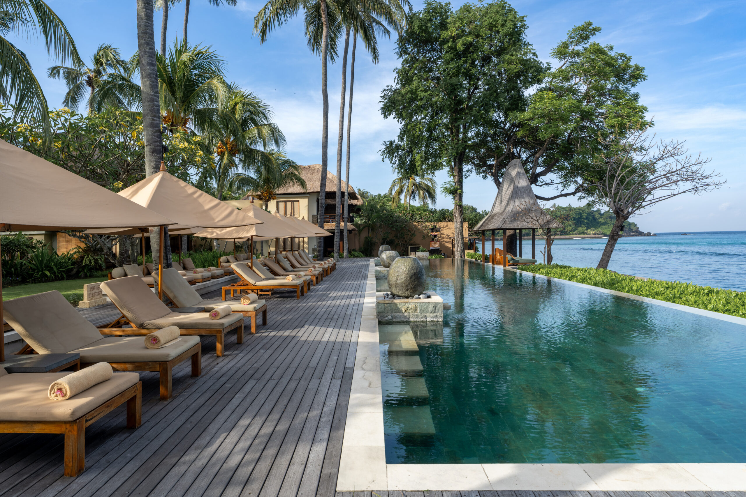 The ocean-facing swimming pool at Qunci Villas Resort