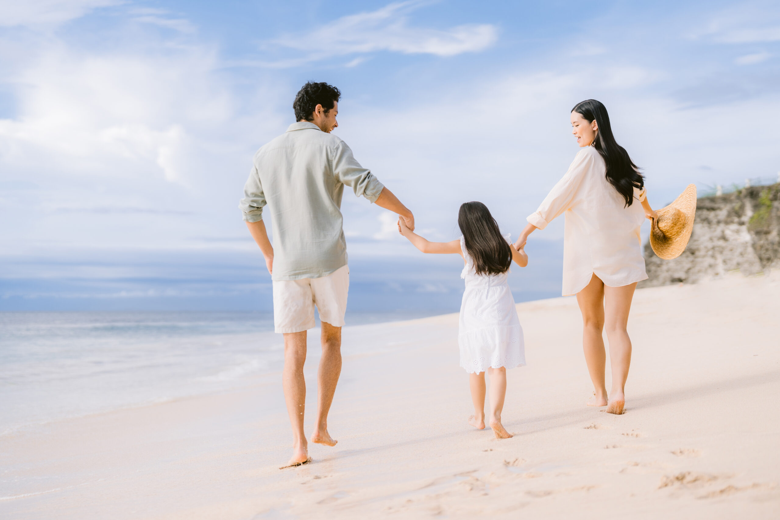 Family playing by the beach in Bali