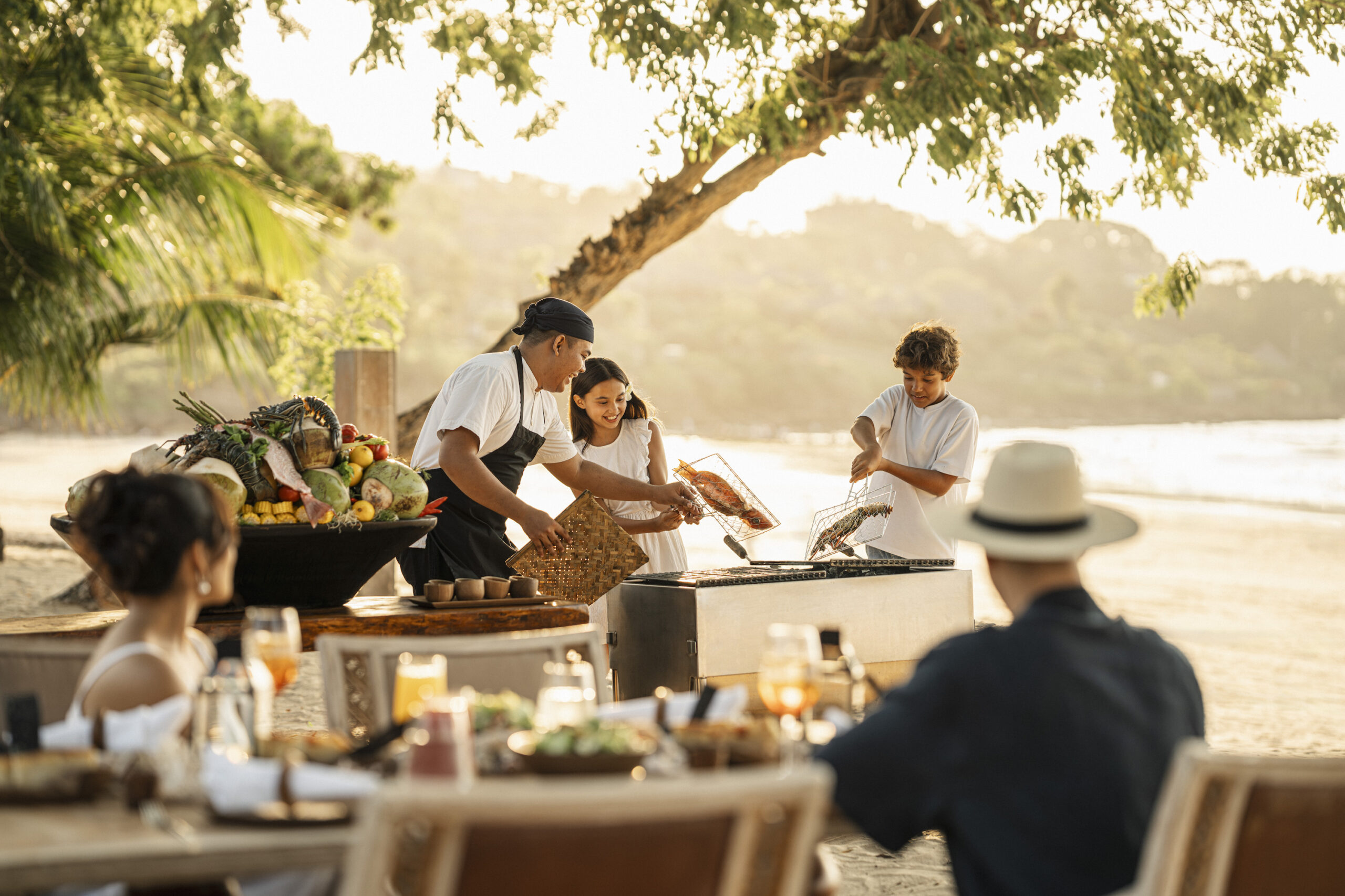 Sunset beach ceremony during the festive season at Four Seasons Jimbaran Bay