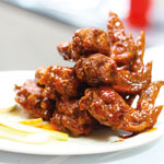 set your taste buds on fire with spicy wings, hot wings, habanero pepper sauce, spicy wing roulette, fried chicken