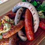 bangers and mash - golden brown, fatty pork sausages