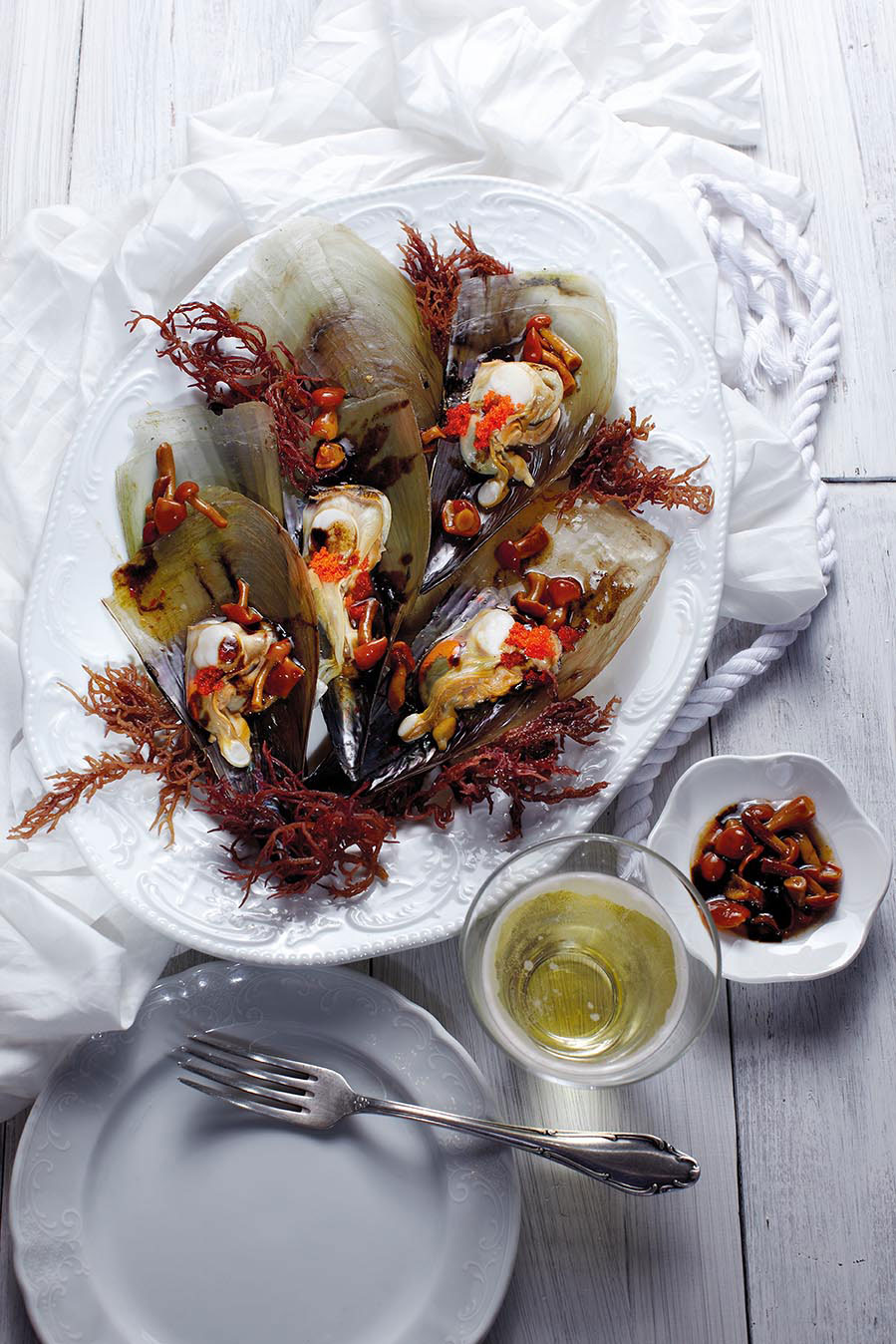 Steamed king scallops with confit of garlicshallotraspberry jam and